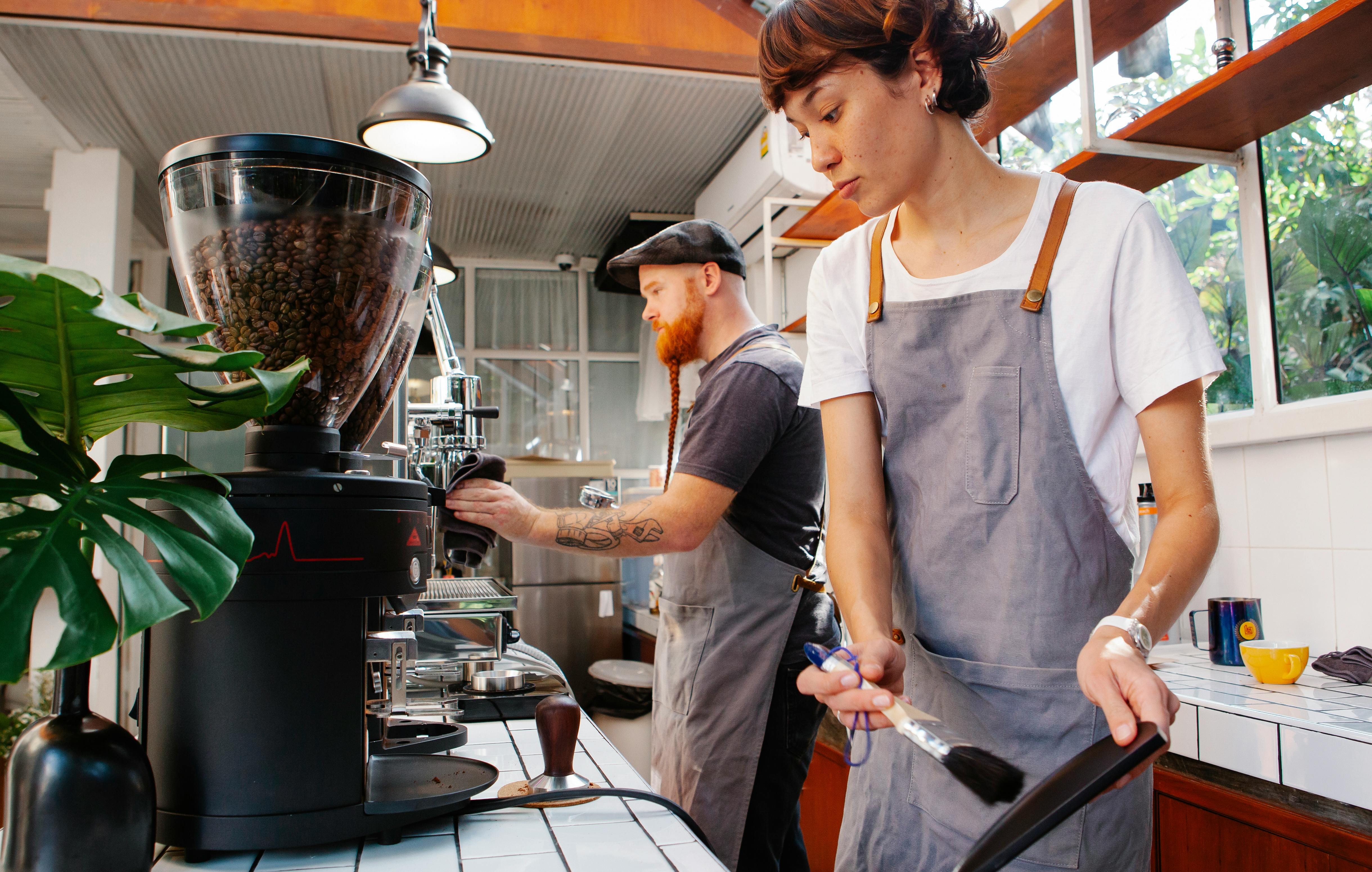 pexels_male female barista working in a cafe